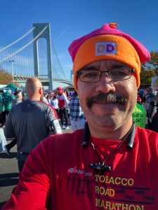 TCS NYW Marathon with Carlos Candelaria Dunkin Donuts knit cap