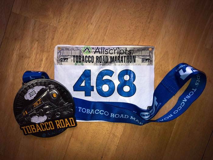 Tobacco Road Marathon 2019 bib and medal
